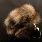 Маленькая золотистая анальная пробка с полосатым хвостом photo 1